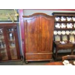 An Edwardian mahogany wardrobe of armoire form,