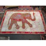 A hand embroidered Indian throw, elephant pattern,