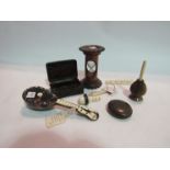 A selection of natural material novelties including an Oriental carved horn snuff box,