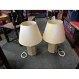 A pair of large cream octagonal crackle glazed table lamps with shades,