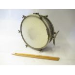 A vintage steel shell marching snare drum and sticks