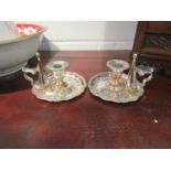 A pair of 19th Century old Sheffield plated chamber sticks