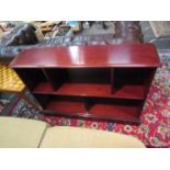 A late 20th Century dark mahogany bookcase,