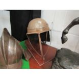 An English Civil War lobster tail style helmet