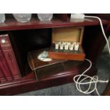 A bygone box instrument, possibly a valve radio device,