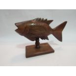 An early 20th Century Pitcairn carved fish,