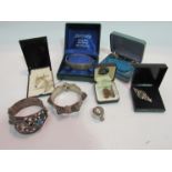 A quantity of white metal jewellery including sword and crescent bracelet