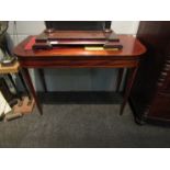 A 19th Century line inlaid mahogany "D" shape side table on fine tapering square legs