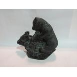 A Canadian coal figure of bear and cub on tree stump