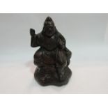 An early 20th Century Japanese bronze figure of a deity, character mark to base,