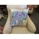 Two Indian hand-embroidered cushions depicting elephants