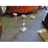 A pair of silverplate on copper candelabra's,