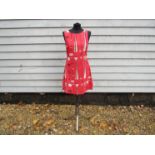 A vintage 1950's dress made from "Kite strings" original material designed by David Parson