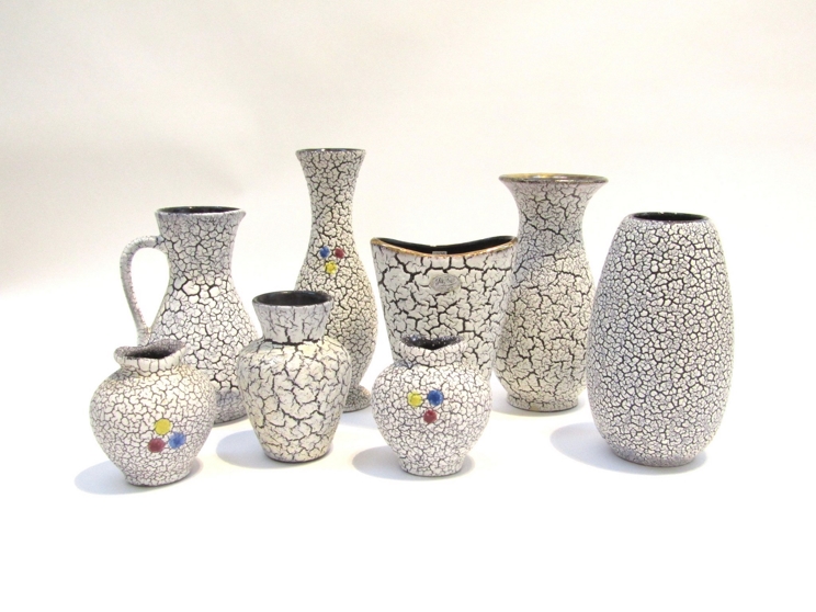 A collection of West German crackle glazes vases, some overpainted with flowers. Tallest 25.