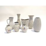 A collection of West German crackle glazes vases, some overpainted with flowers. Tallest 25.