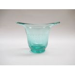 A turquoise ice blue glass vase with elongated lip rim,
