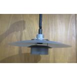 A Danish rise and fall ceiling light in gun metal grey colour and white,