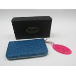 A Zandra Rhodes designer purse in blue, in original box.