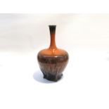 A continental art pottery vase in brown with orange drip glaze 43cm high