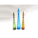 Three Italian "Genie" bottles in blue, amber and green coloured glass.