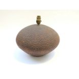 An early Habitat earthenware lamp base, texture finish over a pitted body.