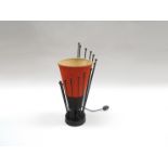 1950's continental black metal abstract form lamp with orange shade.