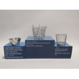A group of Alessi box minatures - FCO3 Blow up fruit basket,
