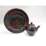 A large vintage studio pottery charger and tenmuko glazed teapot and lid.