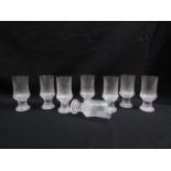 A set of eight Iittala Glass of Finland textured clear glass wine goblets. 13.