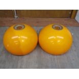 A pair of original circa 1960s vintage Danish orange large perspex light shades,