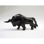 A 1970's abstract carved obsidian bull sculpture, 10.