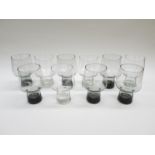 A set of six smoked glass drinking glasses, 14cm tall,