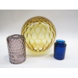 A large vintage 1960s amber glass shade and two others in amethyst and blue.