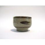 A Leach pottery small bowl, ash glaze with brush dart details, seals fitted with glaze, 6cm x 7.