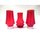 A pair of Riihimaki vases in red by Tamara Aladin, 18cm high plus another similar vase, 16.