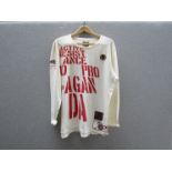 A Vivienne Westwood designed Anglomania range long sleeved top with Active Resistance punk rock