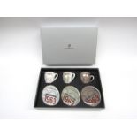 A boxed set of limited addition Porche 1963 motor racing espresso cups and saucers,
