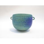 A Studio Pottery bowl, twin loop handles, mottled blue and turquoise glaze. Unmarked.