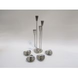 A group of stainless steel candle holders, Danish Tallest 36.