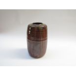 A Studio Pottery vase with a khaki glaze and drip over glaze. Incised mark to base, 24.