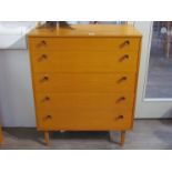 An Avalon Yatton chest of five drawers raised on squared tapering legs. 81.5cm x 45cm x 101cm.