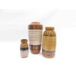 Three West German floor vases with tan glazes, black and white line detail.
