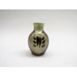 A Winchcombe Pottery small bud vase, painted dash detail. Early impressed seal.