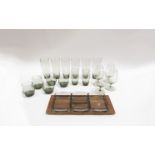 A collection of smoked glass drinking glasses