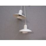 A pair of 'Nordlux' white ceiling lights