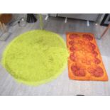 Two 1960's wool rugs in orange and one in green.