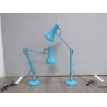 A pair of Anglepoise desk lamps in turquoise colour by Herbert Terry.