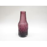 A Whitefriars model 9730 bottle vase in aubergine designed by Geoffrey Baxter,