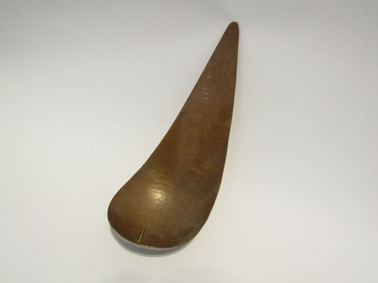 A 1960's planished copper wall candle sconce of tear form.