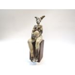 SALLY MACDONELL (b.1971) A Studio pottery seated figure on a plinth. Signed. 31cm tall